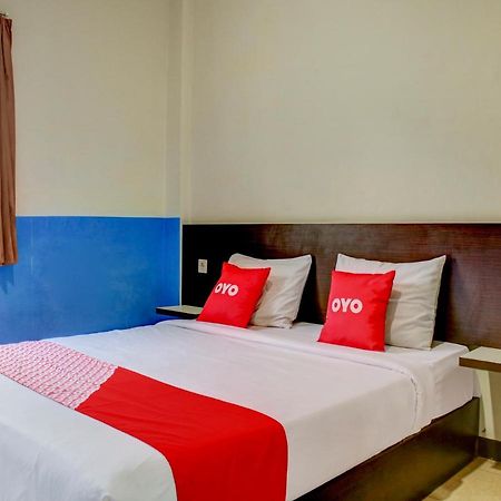 Oyo 90162 Remboelan Guest House Sungai Lutus Esterno foto