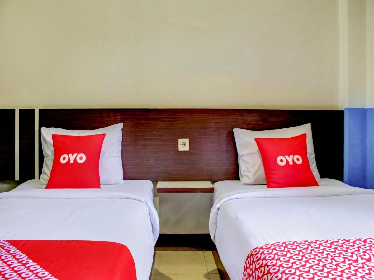 Oyo 90162 Remboelan Guest House Sungai Lutus Esterno foto