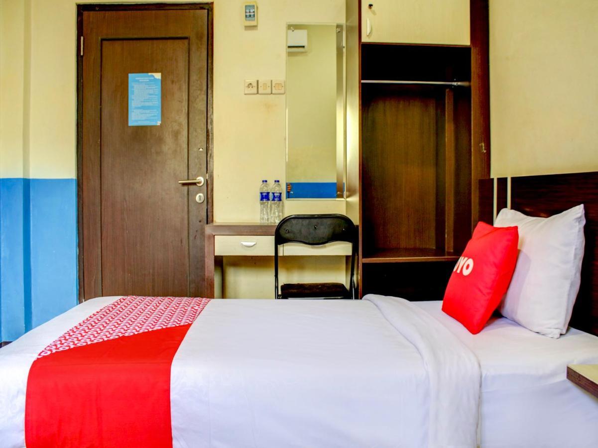 Oyo 90162 Remboelan Guest House Sungai Lutus Esterno foto