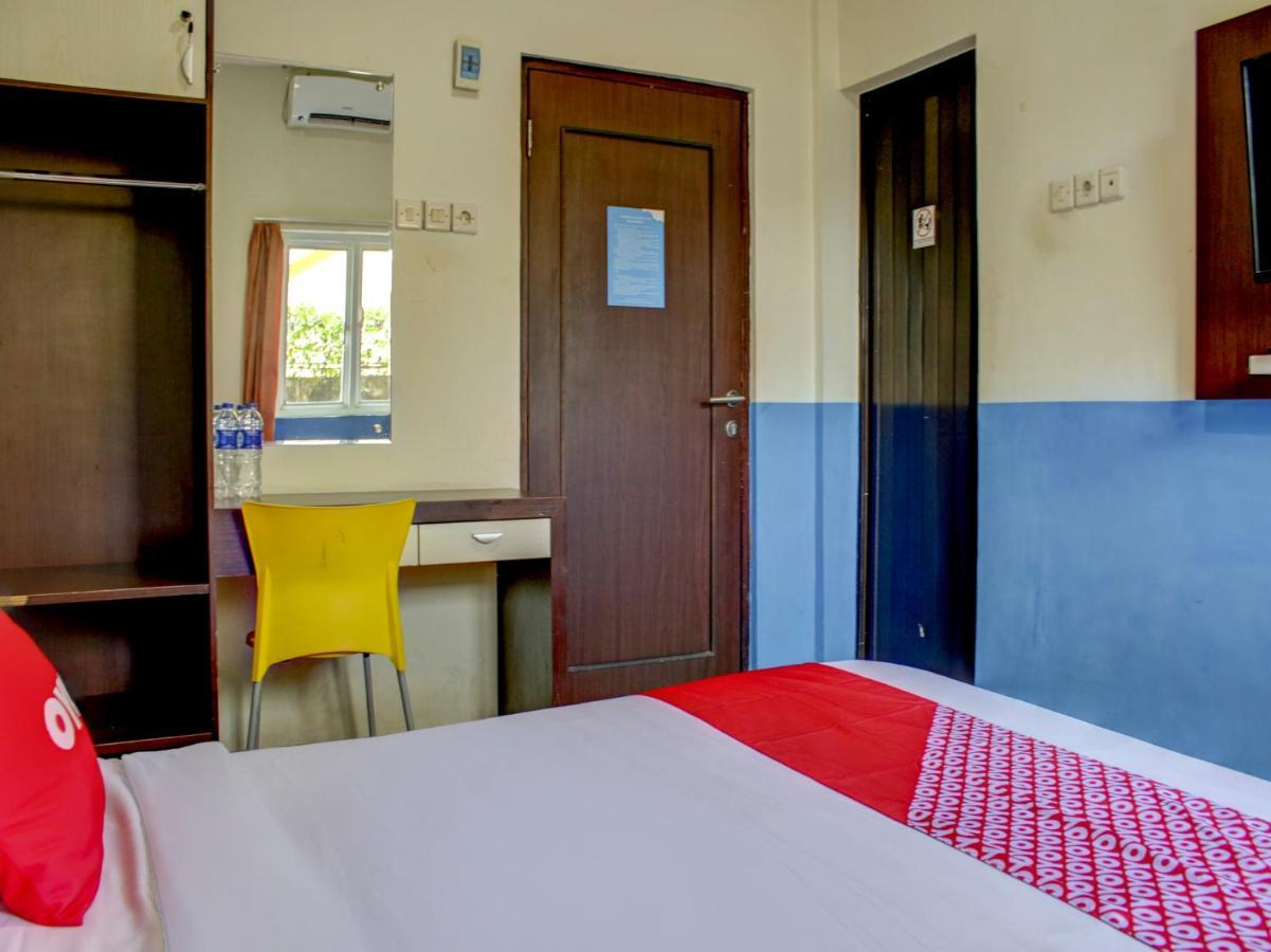 Oyo 90162 Remboelan Guest House Sungai Lutus Esterno foto