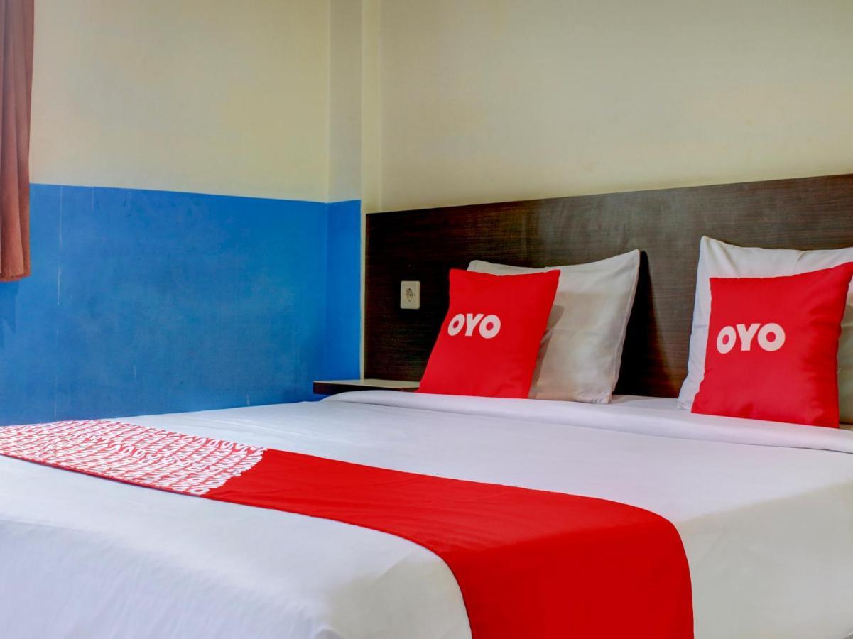 Oyo 90162 Remboelan Guest House Sungai Lutus Esterno foto
