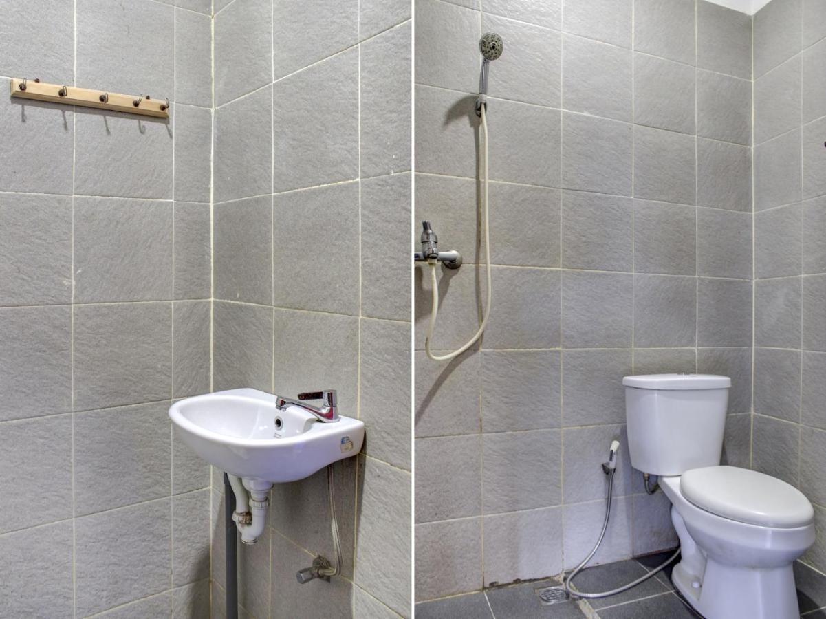 Oyo 90162 Remboelan Guest House Sungai Lutus Esterno foto