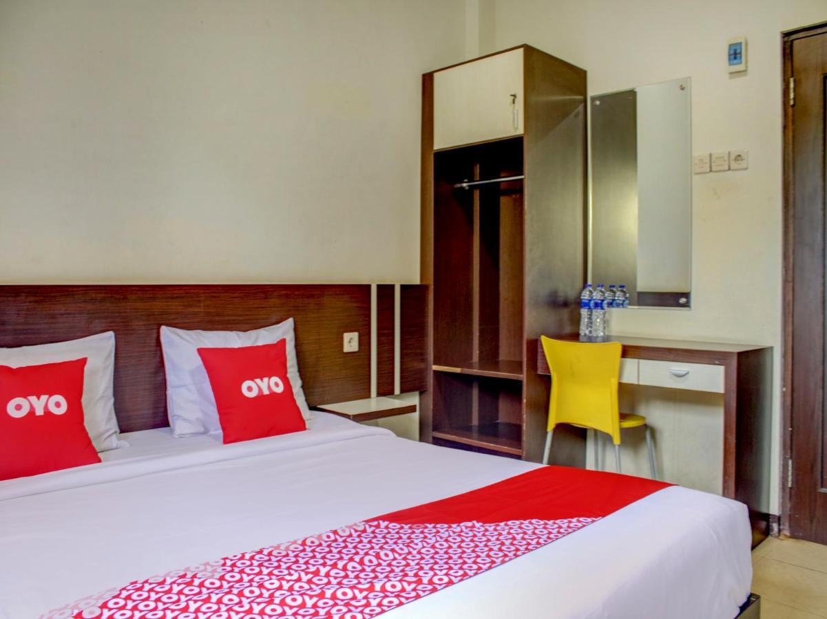 Oyo 90162 Remboelan Guest House Sungai Lutus Esterno foto